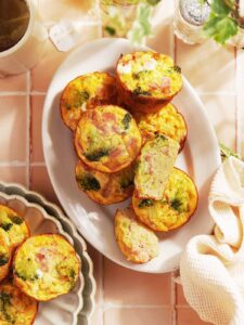 Egg Muffin Cups placed on a white oval plate.
