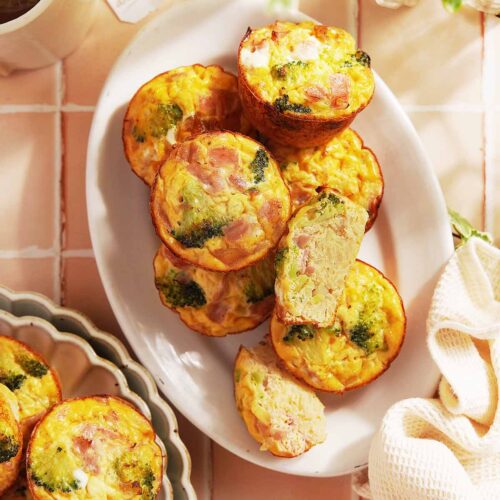 Egg Muffin Cups placed on a white oval plate.